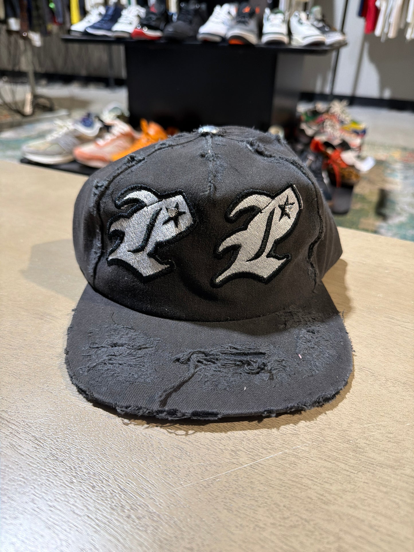 PRIVATE PARTY BLACK DISTRESSED SNAPBACK