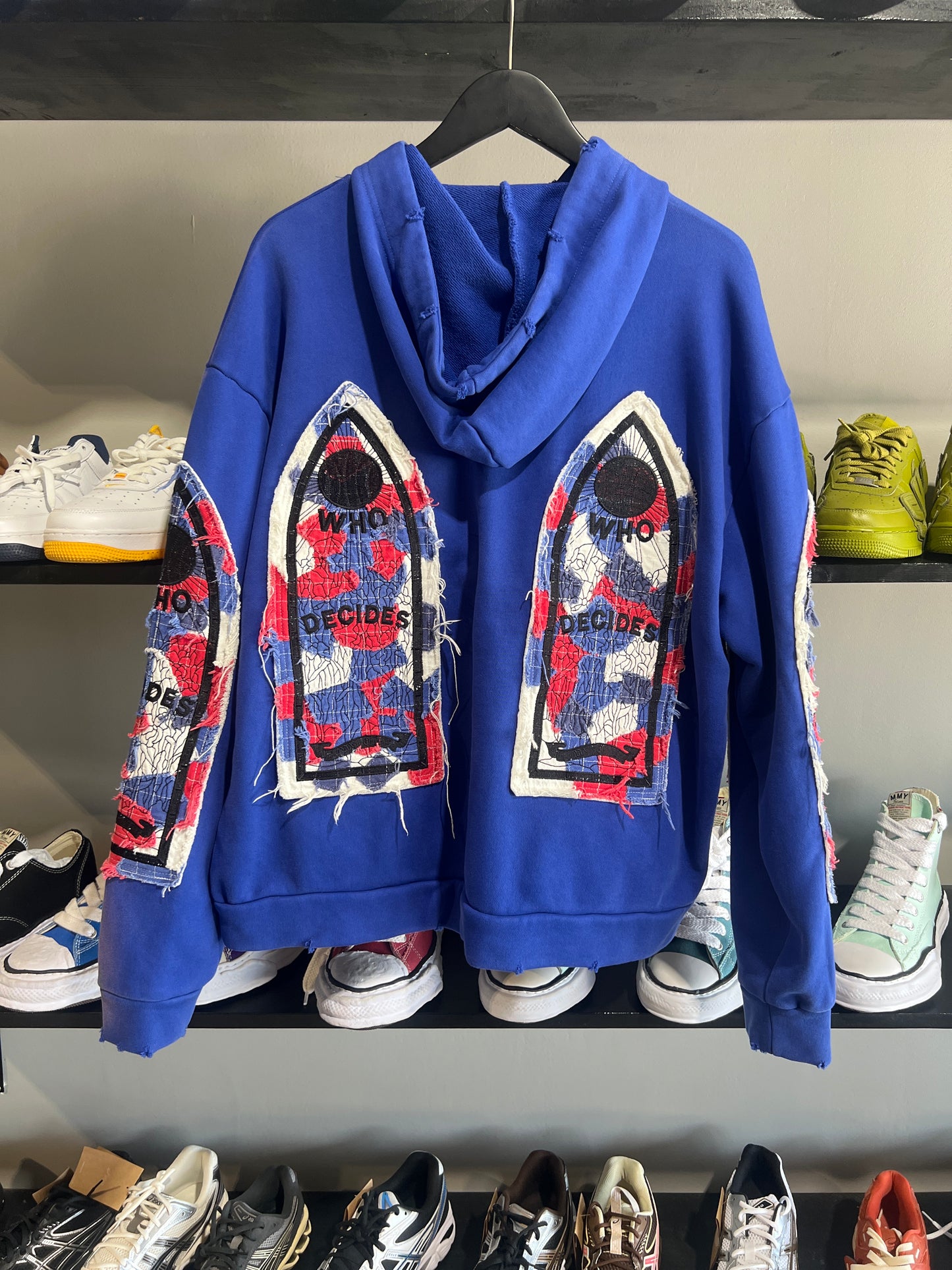 who decides war hoodie blue and red