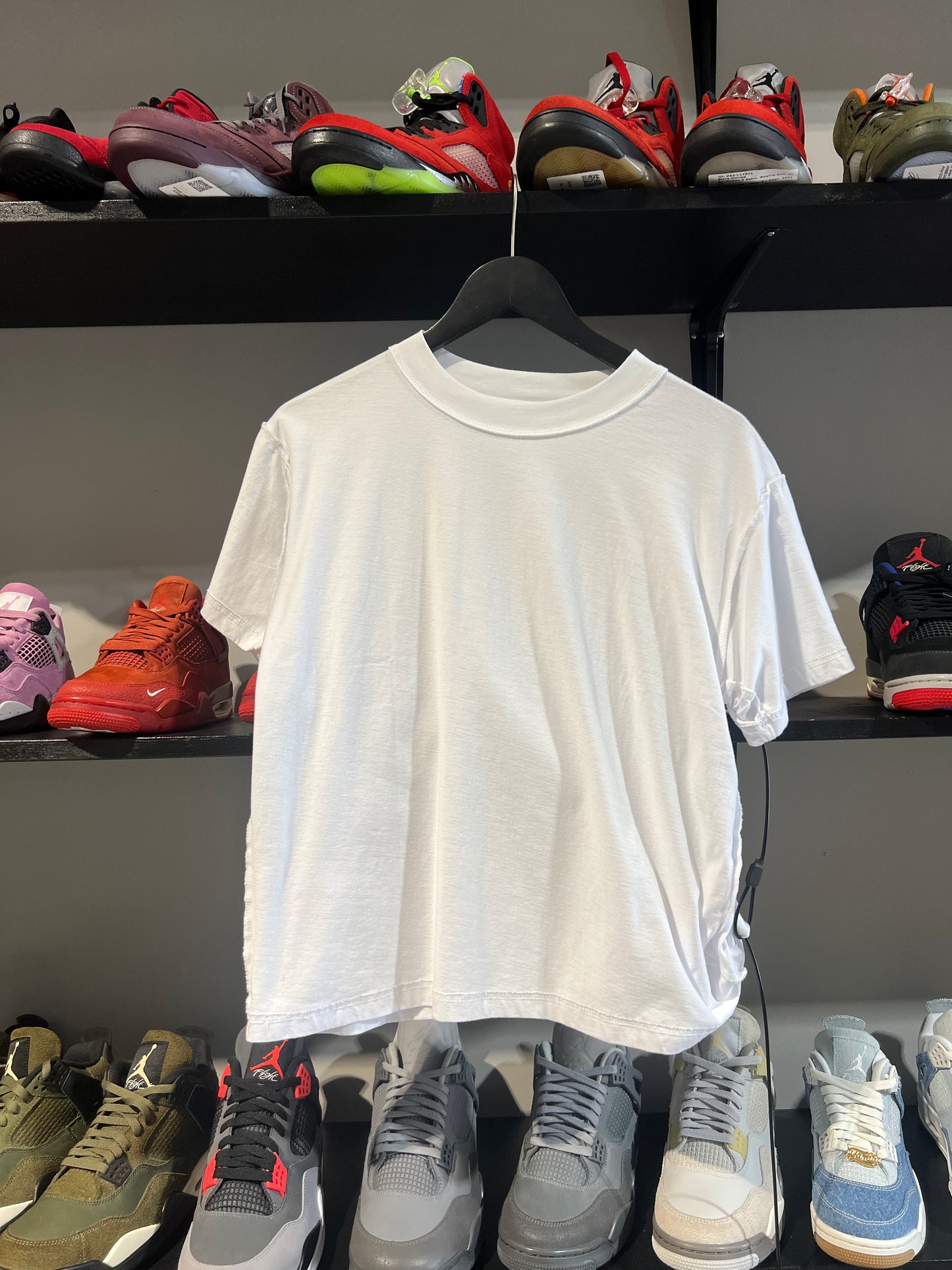 Greedy unit tag tee