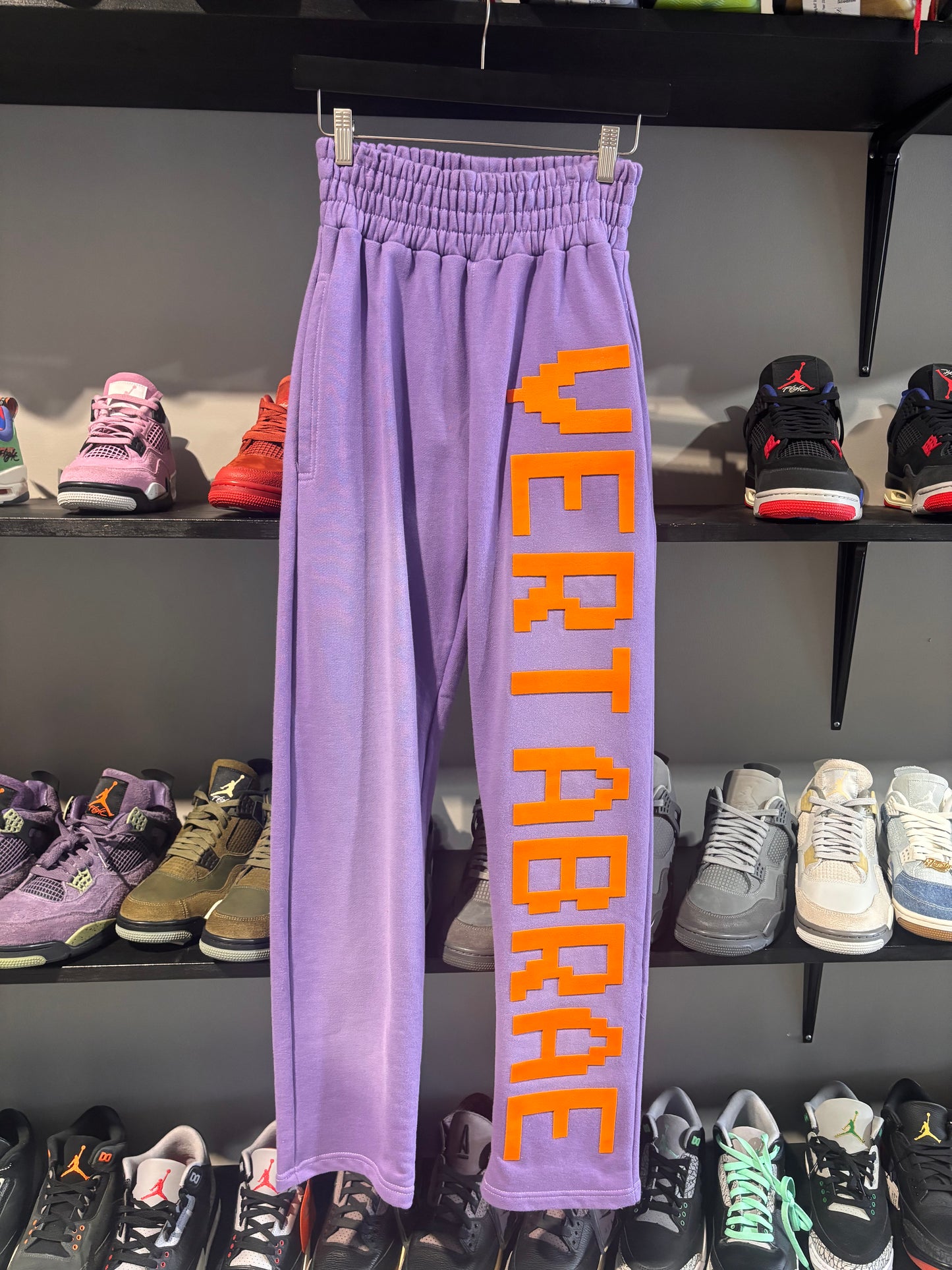 vertabrae purple orange sweatpants