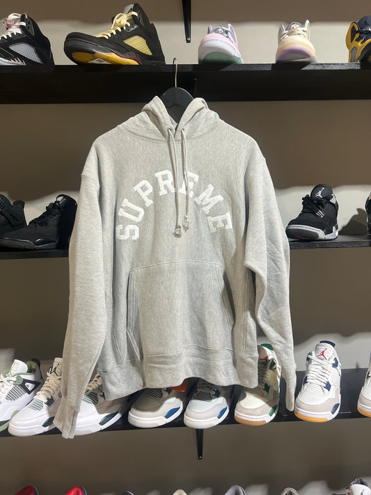 Supreme champion grey and white spell out hood