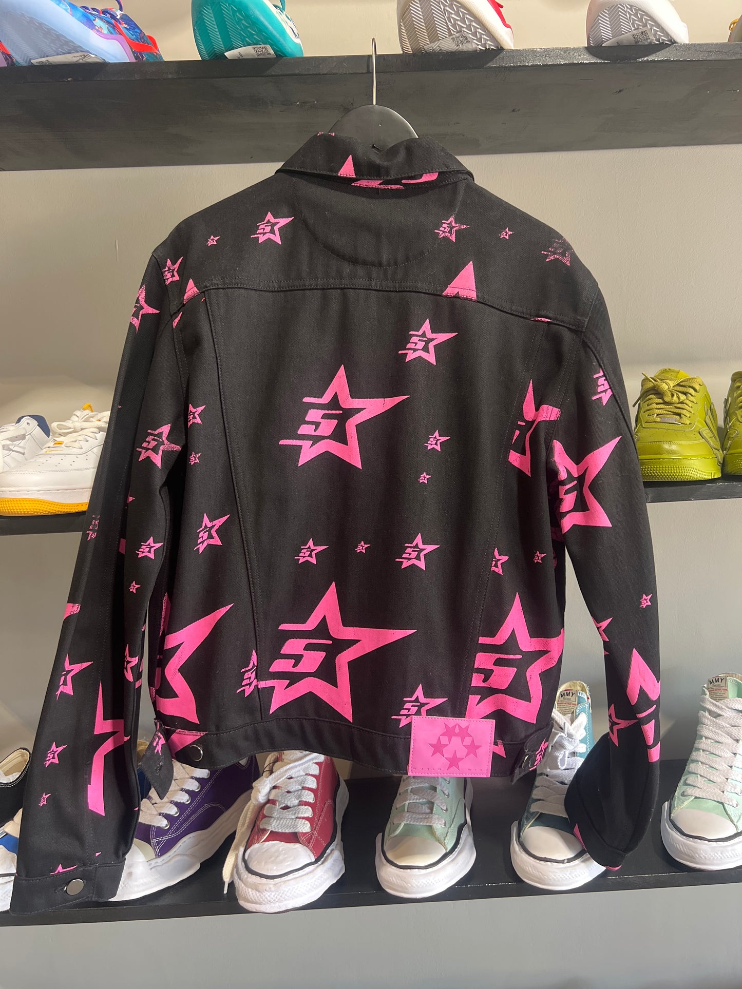 pink and black sp5der jean jacket