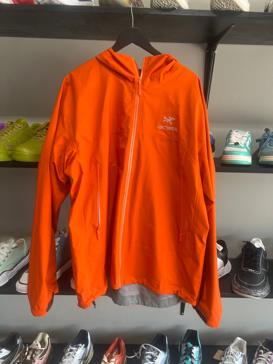 arcteryx zipup neon orange