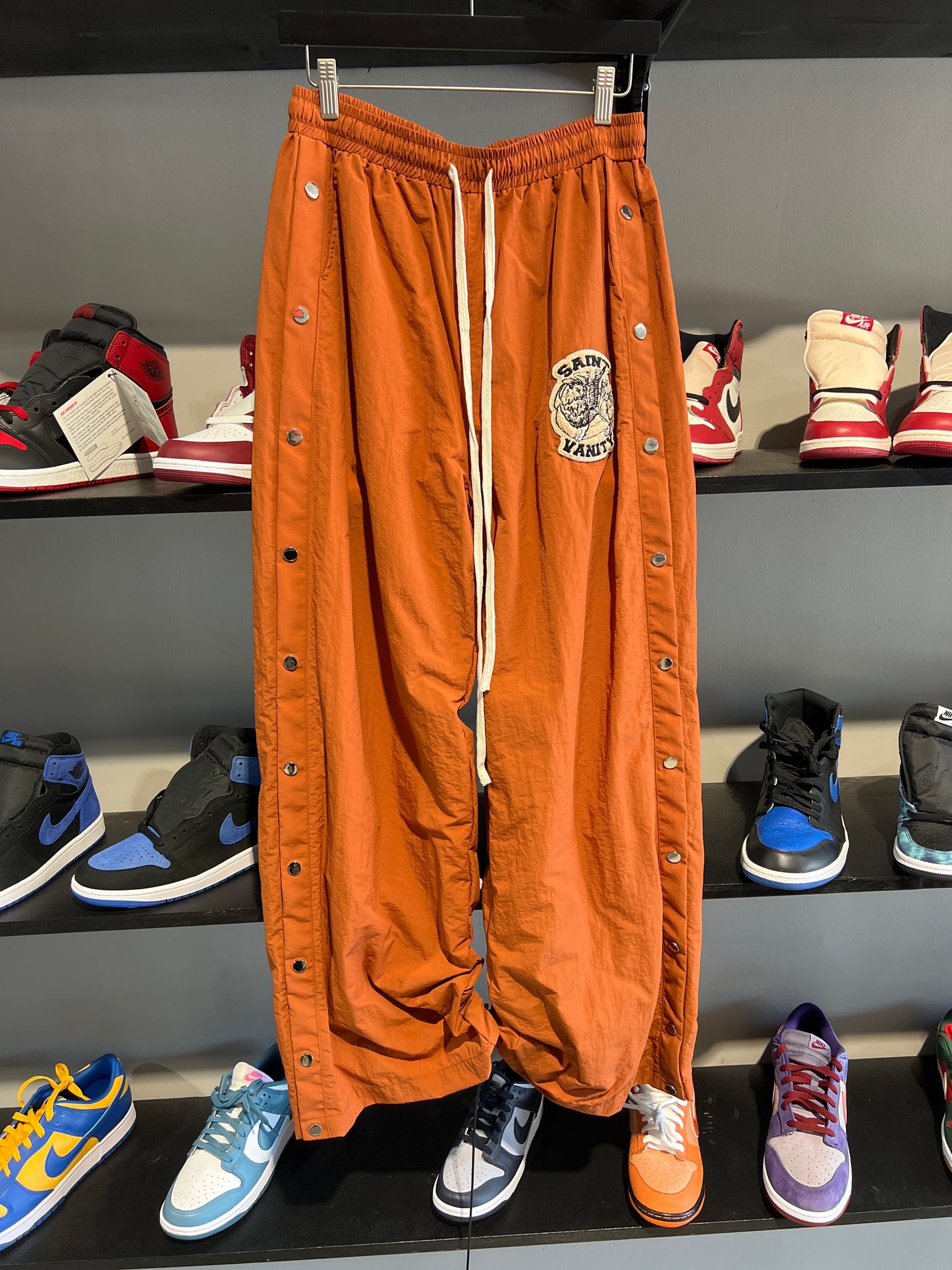 saint vanity orange nylon pants