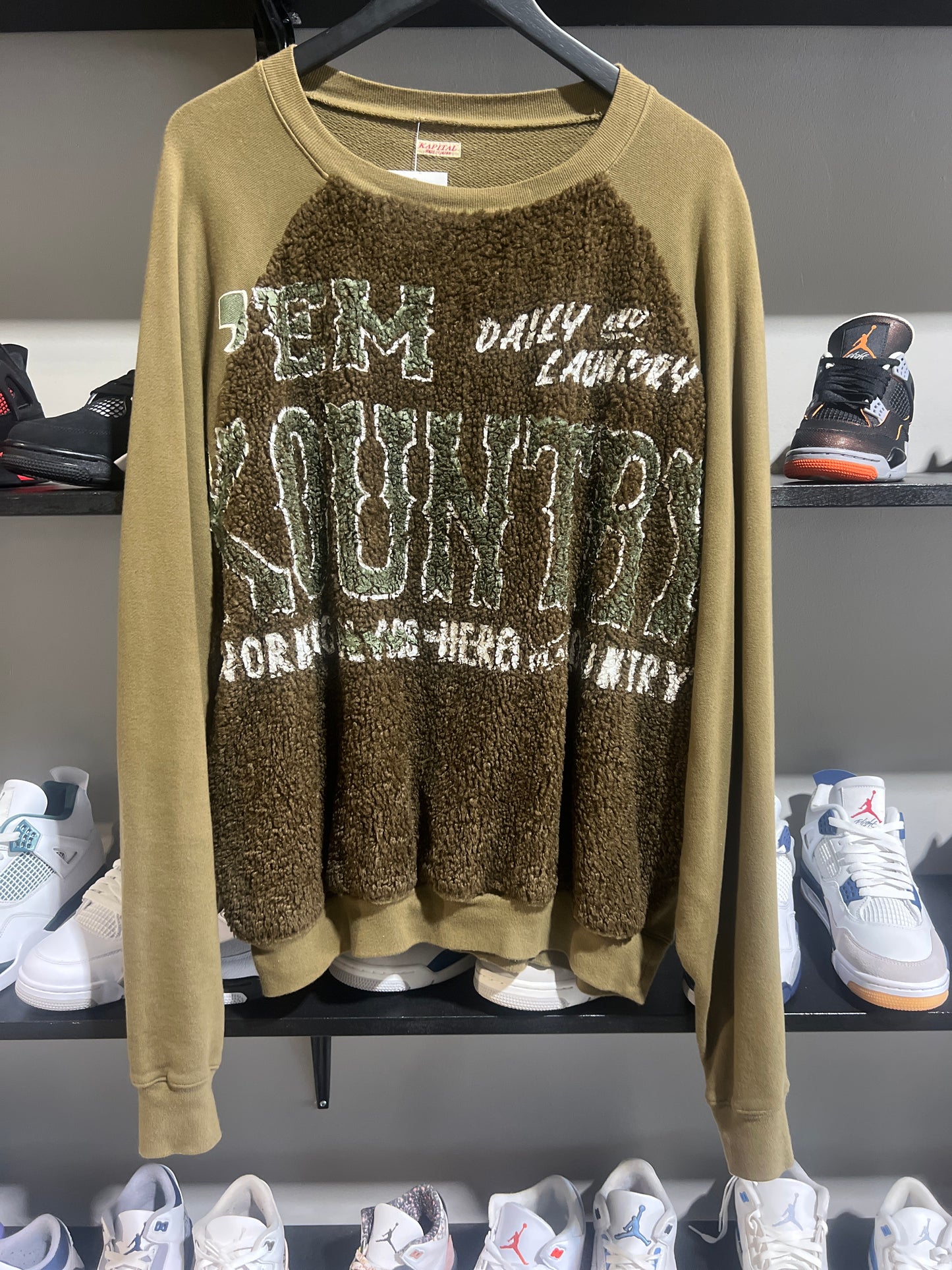 olive kapital fur sweater