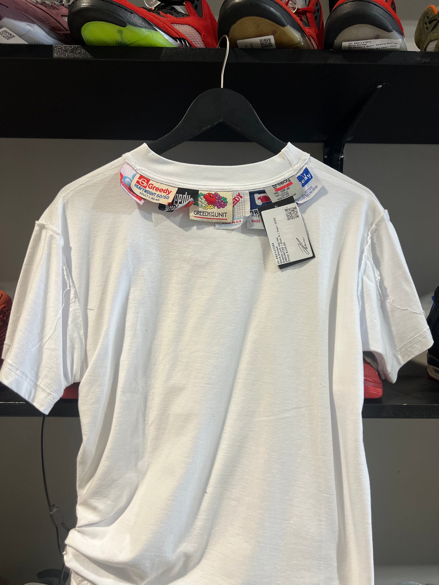 Greedy unit tag tee
