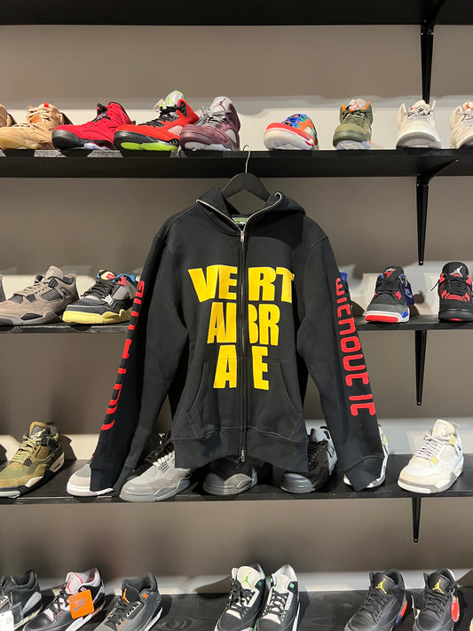 Vertabrae yellow black red zipup