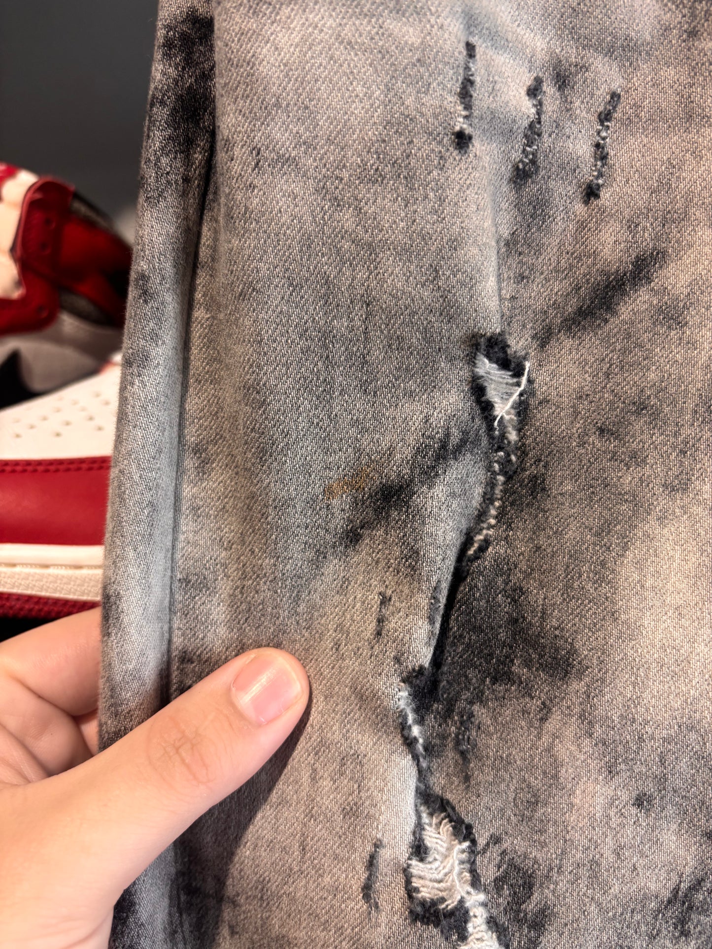 amiri distressed bleached skinny jeans