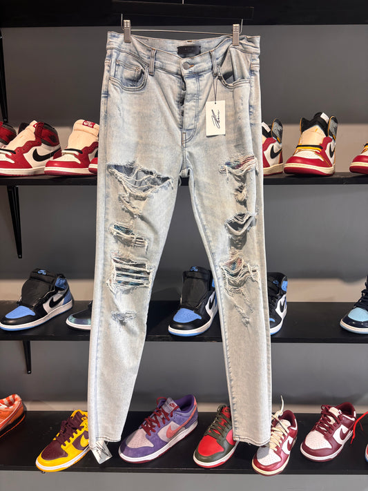 amiri lightwash rainbow patch jeans