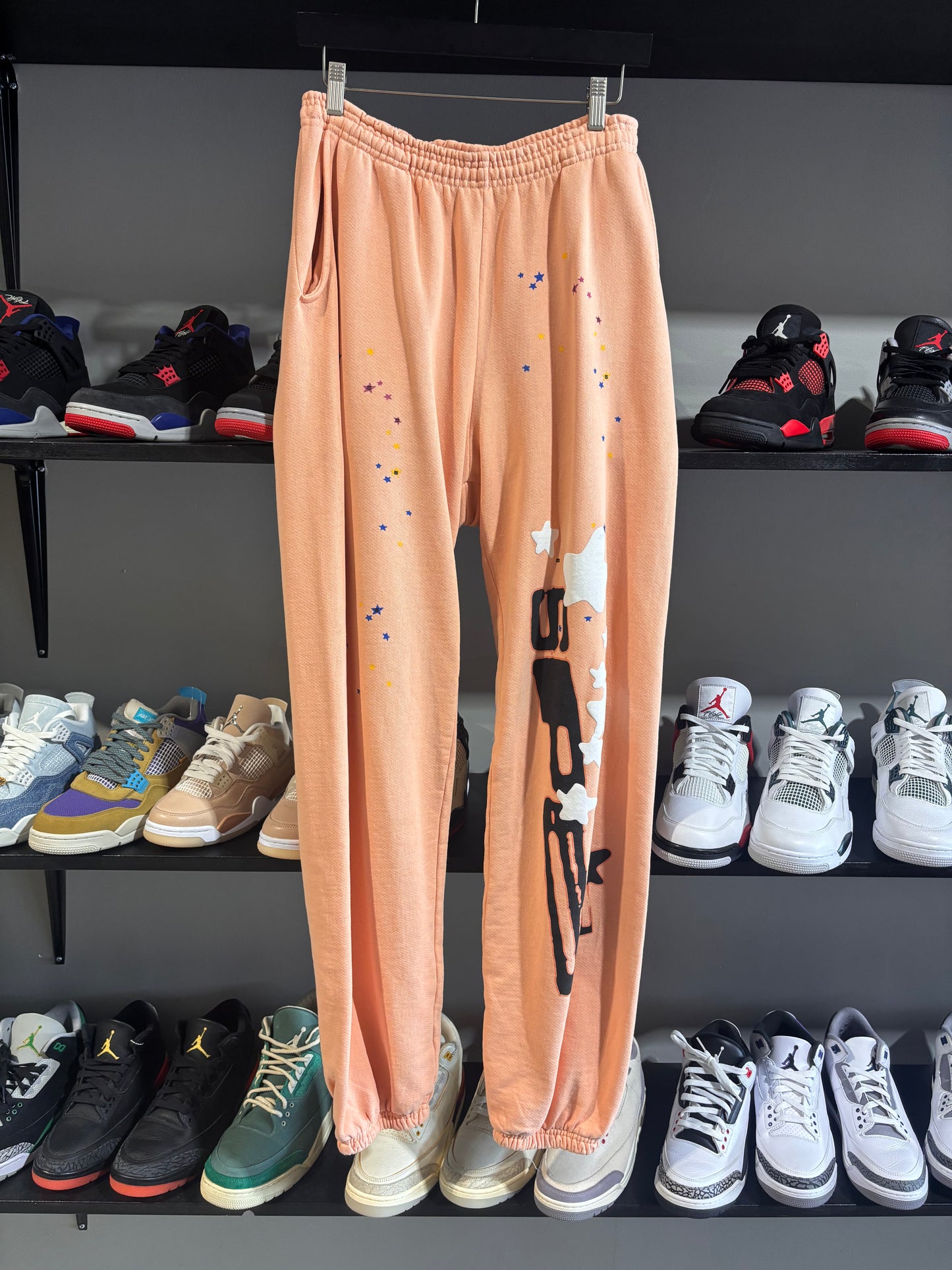 peach sp5der sweatpants