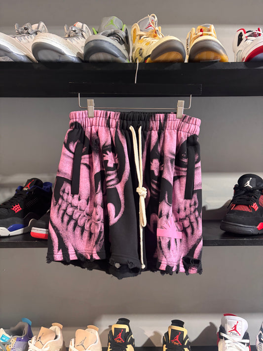vertabrae pink skull shorts