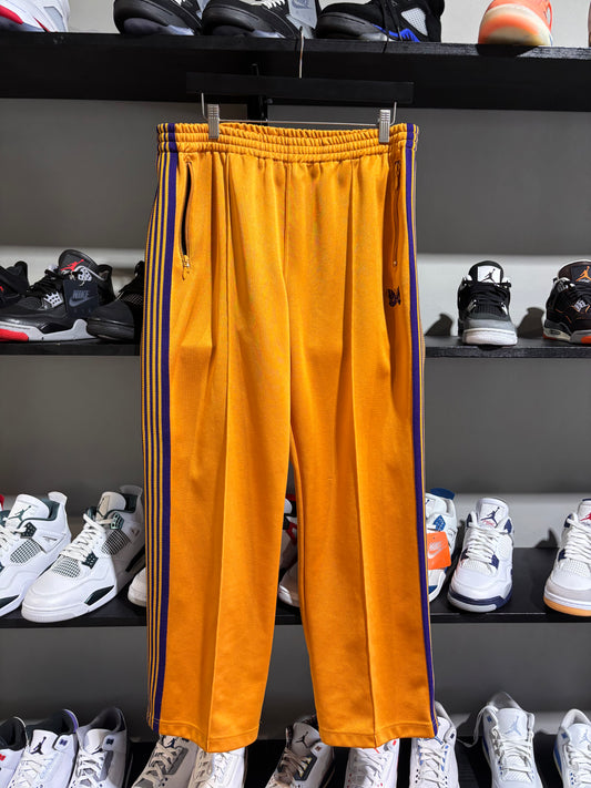 purple/yellow needles sweats