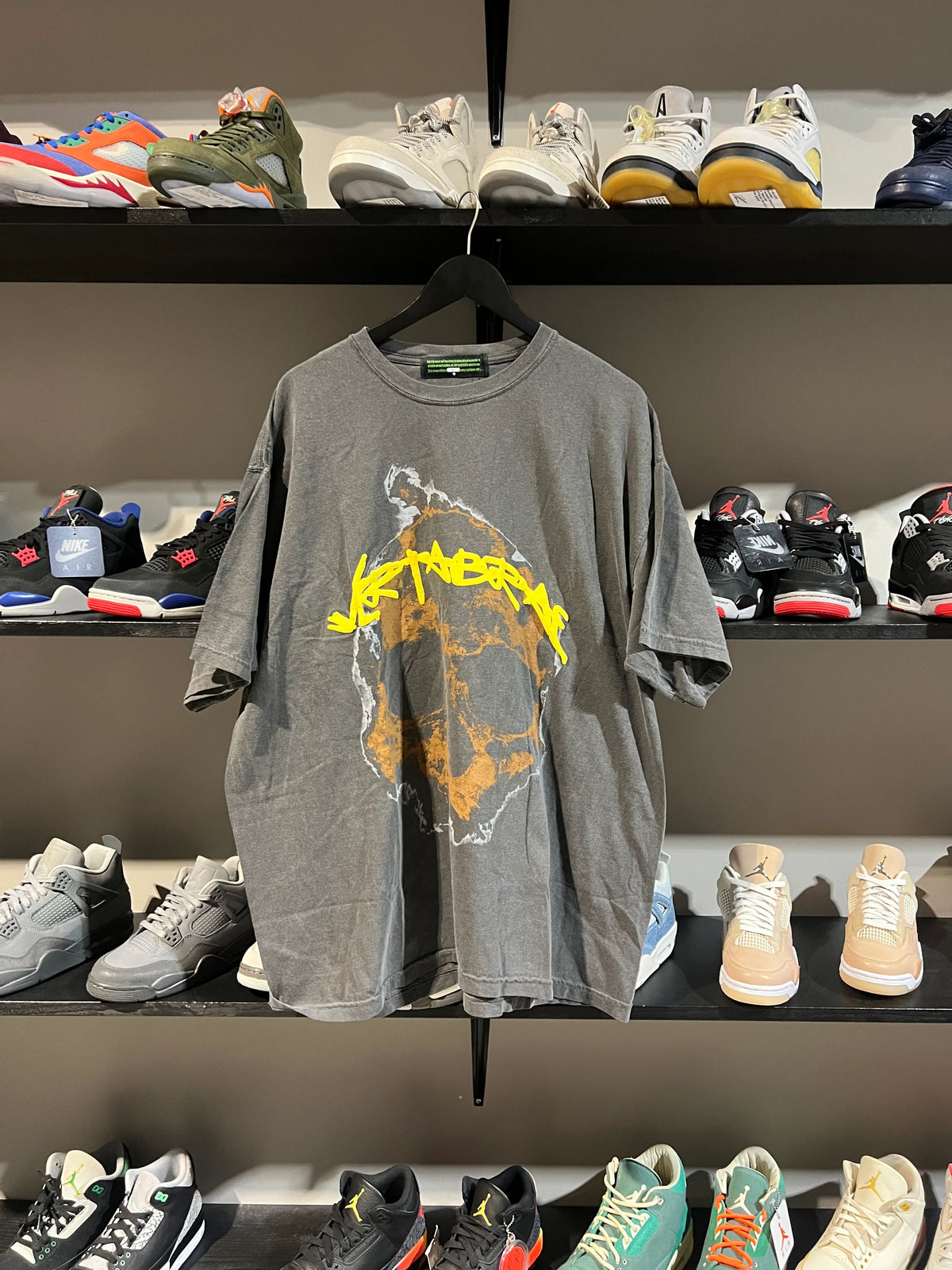 Vertabrae Skull Yellow Spell Out Tee